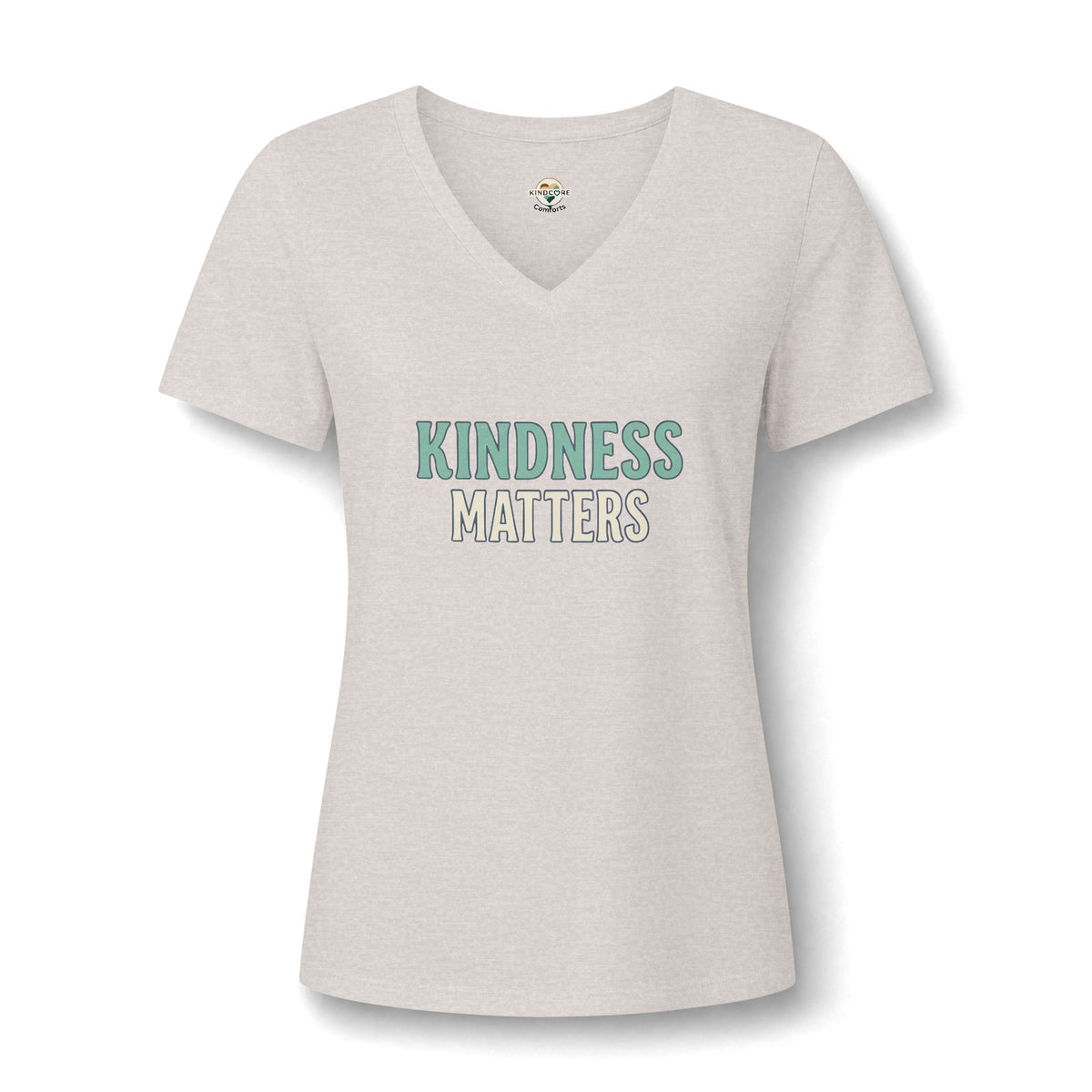 A women's short-sleeve V-neck t-shirt in a light heathered off-white color, featuring the text 'KINDNESS MATTERS'