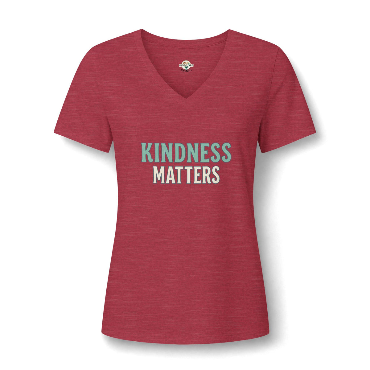 A women's  red V-neck t-shirt with the text 'KINDNESS MATTERS' printed on the chest. 'KINDNESS' is in a light teal-green.