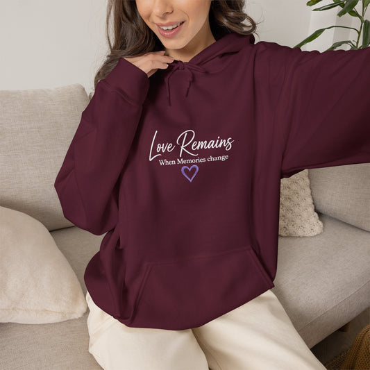 Love Remains Casual Pullover Hoodie - Kindcore ComfortsLove Remains Casual Pullover HoodieMaroonHoodiePrintifyKindcore Comforts76525457076393128319